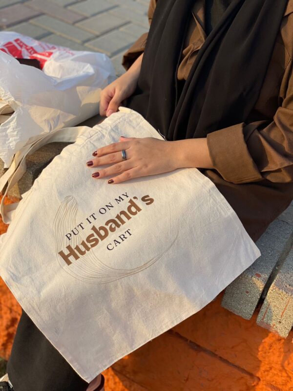 Put it on my husband's cart cotton tote bag